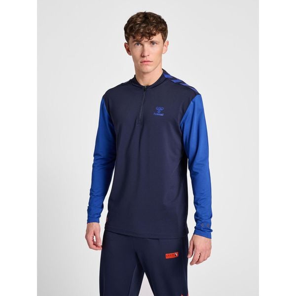 Bluza dresowa 1/2 zip Hummel Pro Grid. Niebieskie bluzy Hummel, bez wzorów, z dresówki, bez kaptura. W wyprzedaży za 249.25 zł.