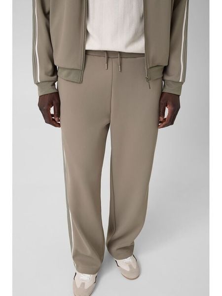 Guess Spodnie materiałowe Z6YB19 K5011 Zielony Regular Fit. Zielone spodnie materiałowe Guess, m, z aplikacjami, z dresówki. Za 390.99 zł.