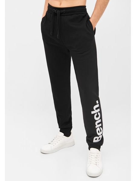 Bench Spodnie dresowe "Stanley Spots" w kolorze czarnym rozmiar: 50. Czarne spodnie treningowe długie Bench, bez wzorów, z dresówki. Za 109.78 zł.