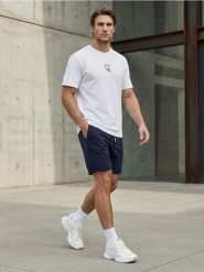 Szorty slim basic - granatowy. Niebieskie krótkie spodenki sportowe Sinsay, l, bez wzorów. W wyprzedaży za 11.99 zł.