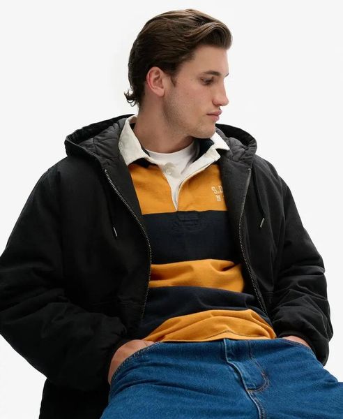 Superdry Kurtka z kapturem Canvas Surplus z bawełny z pikowaną podszewką. Czarne kurtki Superdry, m, z aplikacjami, z bawełny, z kapturem. Za 391.00 zł.