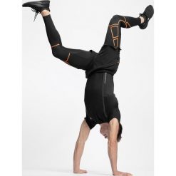 Getry do biegania męskie SPMF254 - głęboka czerń. Legginsy długie sportowe marki WED'ZE. W wyprzedaży za 129.99 zł.