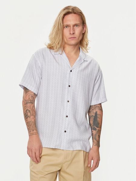 Jack & Jones Koszula Caaron 12255859 Niebieski Relaxed Fit. Niebieskie koszule Jack & Jones, m, bez wzorów, z lyocellu, bez kołnierzyka, bez ramiączek. Za 149.99 zł.