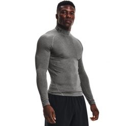 Koszulka z długim rękawem i stójką Under Armour HeatGear®. Czarne odzież kompresyjna Under Armour, xs, bez wzorów, z materiału, na fitness i siłownię. Za 152.54 zł.