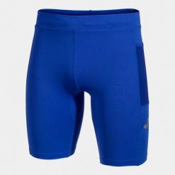 Legginsy Joma Elite X niebieskie do biegania. Niebieskie legginsy długie sportowe Joma, bez wzorów, z materiału, do biegania. Za 287.50 zł.