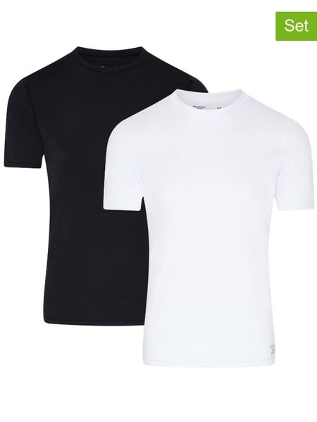 Reebok Koszulki (2 szt.) "Clancy" w kolorze białym i czarnym rozmiar: L. Białe bezrękawniki Reebok, l, bez wzorów, bez kołnierzyka, bez ramiączek. Za 81.95 zł.