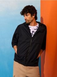 Kurtka techniczna z kapturem i ściągaczami - granatowy. Niebieskie kurtki Sinsay, l, bez wzorów, z kapturem. Za 69.99 zł.