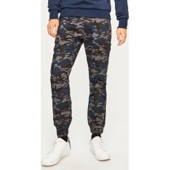 Spodnie jogger slim fit - Szary. Joggery i bojówki Reserved. Za 129.99 zł.