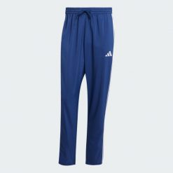 Spodnie Essentials 3-Stripes Stanford Open Hem. Białe spodnie treningowe długie Adidas, l, bez wzorów, z materiału. Za 179.00 zł.