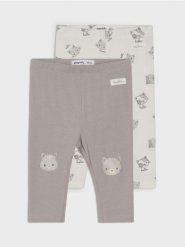 Bawełniane legginsy z motywem kotów - kremowy. Białe legginsy długie sportowe Sinsay, l, bez wzorów, z bawełny. W wyprzedaży za 15.99 zł.