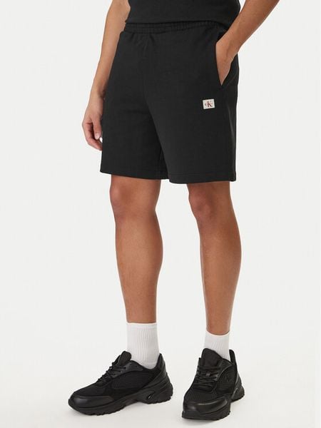 Calvin Klein Jeans Szorty sportowe Badge LV04RF282G Czarny Regular Fit. Czarne krótkie spodenki sportowe Calvin Klein Jeans, m, bez wzorów, z bawełny. Za 245.99 zł.