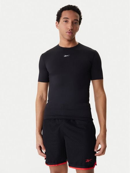 Reebok Koszulka techniczna RK25599CCM Czarny Slim Fit. Czarne t-shirty sportowe Reebok, bez wzorów, z syntetyku, bez ramiączek, na fitness i siłownię. Za 79.99 zł.