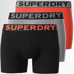 Bokserki z bawełny organicznej Superdry (x3). Brązowe bokserki Superdry, m, bez wzorów, z bawełny. Za 132.90 zł.