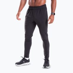 Spodnie treningowe męskie Built For Athletes Performance Joggers. Czarne buty treningowe BUILT FOR ATHLETES, bez wzorów, na fitness i siłownię. Za 329.99 zł.