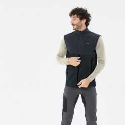 Kamizelka turystyczna męska polarowa Quechua MH500. Czarne odzież kompresyjna QUECHUA, l, bez wzorów, z elastanu, trekkingowe. Za 139.99 zł.