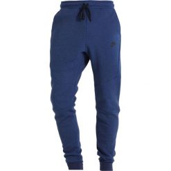 Nike Sportswear TECH JOGGER Spodnie treningowe obsidian/heather/black. Joggery i bojówki marki Nike Sportswear. Za 319.00 zł.