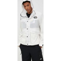 The North Face kurtka Outline męska kolor beżowy przejściowa. Brązowe kurtki The North Face, l, bez wzorów, z materiału, z kapturem. W wyprzedaży za 519.99 zł.