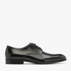 Czarne półbuty męskie ANDREW. Czarne eleganckie półbuty Ryłko, bez wzorów, ze skóry, bez obcasa, bez zapięcia. Za 499.99 zł.