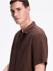 Muślinowa koszula comfort fit - brązowy. Brązowe koszule Reserved, l, bez wzorów, z bawełny, bez kołnierzyka, bez ramiączek. Za 129.99 zł.