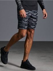 Szorty z wiązaniem SNSY Performance - wielobarwny. Krótkie spodenki sportowe Sinsay, l, bez wzorów. W wyprzedaży za 19.99 zł.