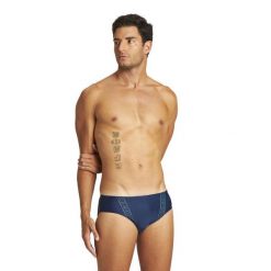 Kąpielówki slipy męskie na basen Arena Poise Brief. Niebieskie odzież kąpielowa Arena, m, bez wzorów, sportowe. Za 51.38 zł.