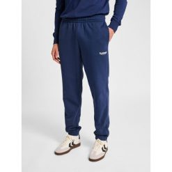 Spodnie do biegania Hummel Legacy 2.0. Niebieskie spodnie materiałowe Hummel, na co dzień, na lato, bez wzorów, z dresówki, sportowe. Za 269.50 zł.