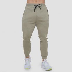 Joggery męskie fitness slim ze sznurkiem szałwiowe Agile. Joggery i bojówki GYMBEAM, m, bez wzorów, z bawełny, sportowe. Za 126.90 zł.