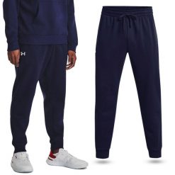 Spodnie dresowe męskie UNDER ARMOUR Rival Fleece joggery. Niebieskie joggery i bojówki Under Armour, m, bez wzorów, z dresówki, sportowe. W wyprzedaży za 163.50 zł.