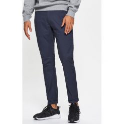 Materiałowe spodnie typu chino - Granatowy. Spodnie materiałowe Cropp. Za 89.99 zł.