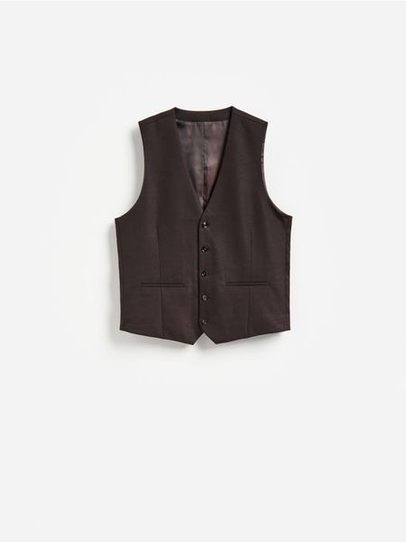 Garniturowa kamizelka - ciemnobrązowy. Brązowe garnitury Reserved, l, bez wzorów, z tkaniny. Za 159.99 zł.