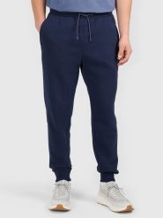 4F Spodnie dresowe w kolorze granatowym rozmiar: M. Niebieskie spodnie treningowe długie 4F, m, bez wzorów, z dresówki. Za 74.46 zł.