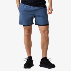 Szorty treningowe Trening Męska Swedemount Core 2-In-1 Shorts szybkoschnące. Niebieskie krótkie spodenki sportowe SWEDEMOUNT, m, bez wzorów. Za 169.99 zł.