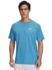 Under Armour Koszulka funkcyjna w kolorze niebieskim rozmiar: L. Niebieskie t-shirty sportowe Under Armour, bez wzorów, z materiału, bez ramiączek, outdoorowe. Za 91.99 zł.