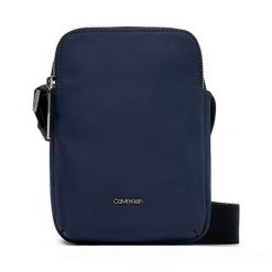 Saszetka Calvin Klein. Niebieskie saszetki i nerki CALVIN KLEIN, bez wzorów. Za 209.99 zł.