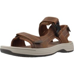 Sandały CLARKS 26184778C Brązowy. Brązowe sandały Clarks, ze skóry, bez zapięcia. Za 388.99 zł.