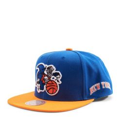 Czapka typu snapback New York Knicks HWC Team Origins. Niebieskie czapki z daszkiem Mitchell & Ness, bez wzorów. Za 198.50 zł.