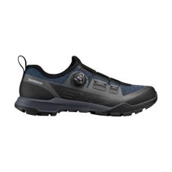 Buty Shimano SH-EX700. Niebieskie buty turystyczne Shimano, na zimę, bez wzorów, z materiału, bez zapięcia, rowerowe. Za 759.20 zł.