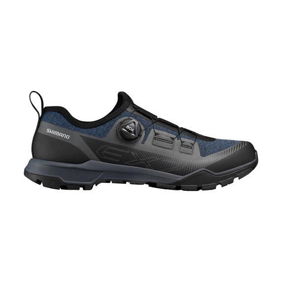 Buty do rowerów turystycznych EX700, niebieskie. Niebieskie buty turystyczne Shimano, bez wzorów, z gumy, bez zapięcia, rowerowe. Za 745.35 zł.