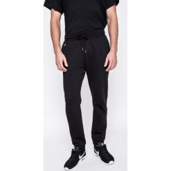 Puma - Spodnie Puma x XO The Weeknd. Spodnie treningowe długie marki Puma. W wyprzedaży za 239.90 zł.