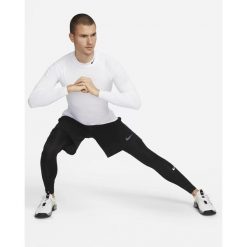 Legginsy sportowe męskie Nike. Czarne legginsy długie sportowe Nike, na co dzień, m, bez wzorów, z dresówki, casualowe. W wyprzedaży za 146.90 zł.