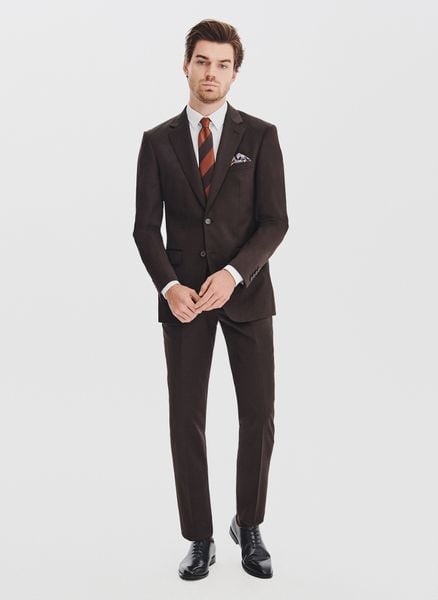 PAKO LORENTE - Brązowy garnitur męski. Brązowe garnitury Pako Lorente, do pracy, m, bez wzorów, z poliesteru. Za 1,389.98 zł.