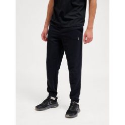 Spodnie do biegania Hummel Pulse. Czarne buty treningowe Hummel, bez wzorów, z dresówki, do biegania. Za 170.00 zł.