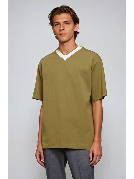 Weekday Koszulka w kolorze khaki rozmiar: XL. Brązowe bezrękawniki Weekday, xl, bez wzorów, z bawełny, bez kołnierzyka, bez ramiączek. Za 37.30 zł.