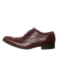 Clarks Skórzane trzewiki "Gilmore Wing" w kolorze ciemnobrązowym rozmiar: 40. Brązowe botki sznurowane Clarks, bez wzorów, bez obcasa, bez zapięcia. Za 234.42 zł.