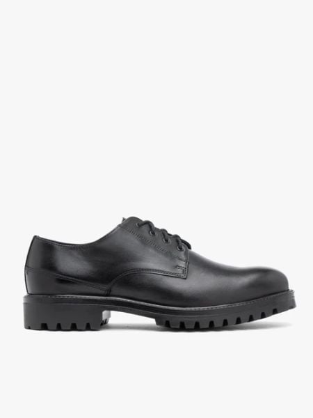 Czarne skórzane półbuty. Czarne eleganckie półbuty Ryłko, bez wzorów, ze skóry, bez obcasa, na płaskiej podeszwie, bez zapięcia. Za 499.99 zł.