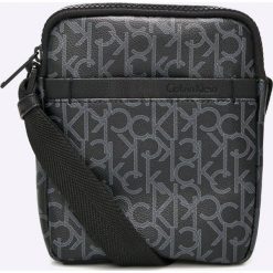 Calvin Klein Jeans - Saszetka. Saszetki i nerki marki Calvin Klein Jeans, w paski, z jeansu. W wyprzedaży za 259.90 zł.