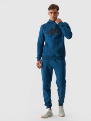 4F Spodnie dresowe joggery męskie - turkusowe M. Niebieskie spodnie materiałowe 4F, na co dzień, m, bez wzorów, z bawełny, sportowe. W wyprzedaży za 79.99 zł.