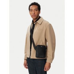 Saszetka Tommy Hilfiger. Czarne saszetki i nerki Tommy Hilfiger, bez wzorów. Za 369.99 zł.