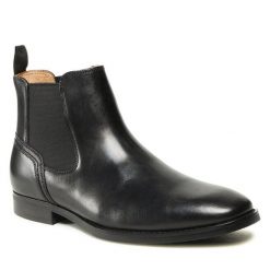 Sztyblety GINO ROSSI. Czarne sztyblety Gino Rossi, bez wzorów, bez obcasa, bez zapięcia. Za 379.99 zł.