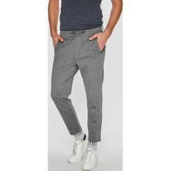 Jack & Jones - Spodnie. Spodnie materiałowe marki Jack & Jones. W wyprzedaży za 89.90 zł.